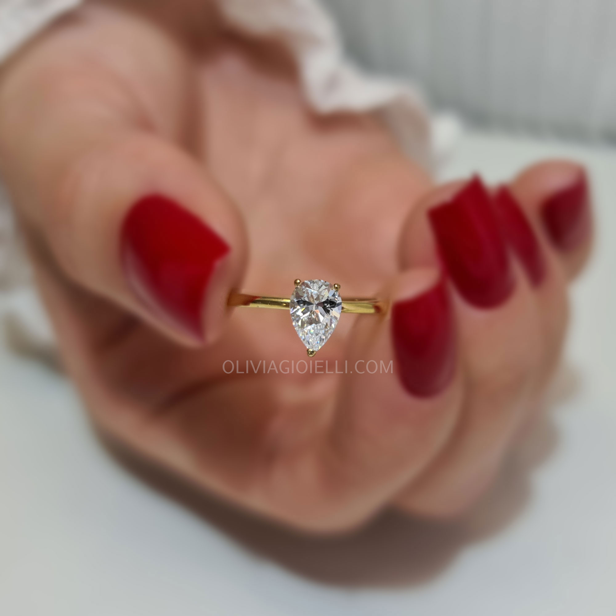 Delicate Pear Shaped Engagement Ring